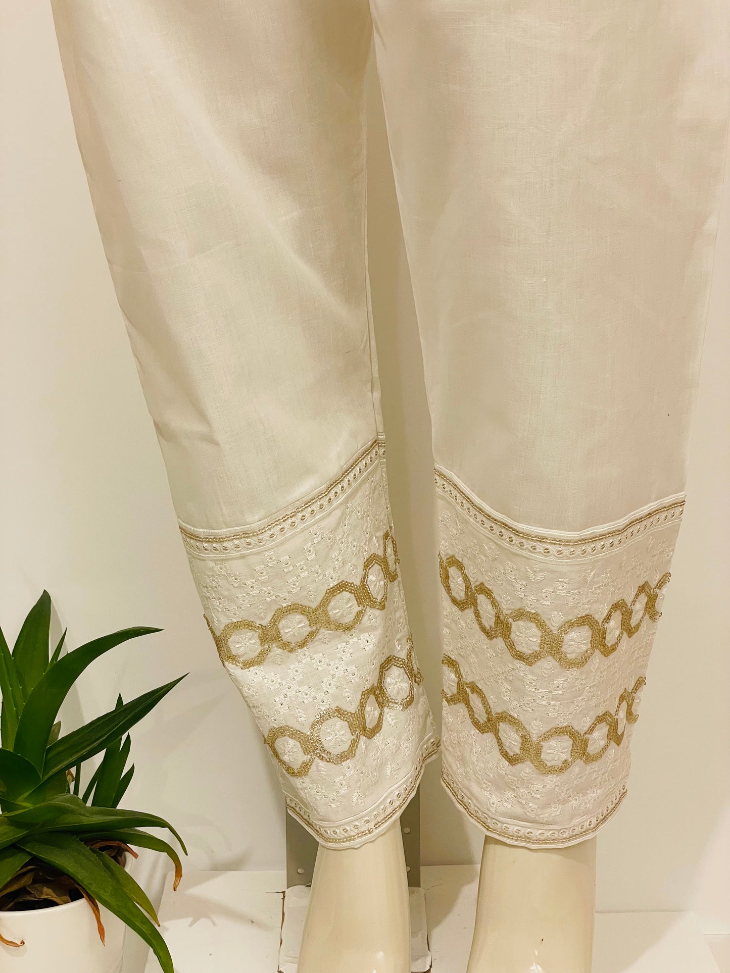 Locado Woolen Cream Colour Embroidery Palazzo Pants with Buttons on Surface.